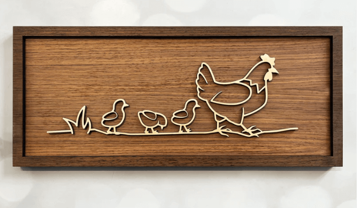 Hen and Chicks Line Art – minimalist wooden wall art handcrafted in New Zealand by Soul Etch, featuring a hen and chicks on a walnut background.