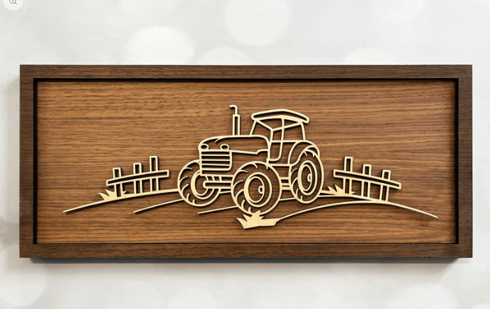 Tractor Line Art – minimalist wooden wall art handcrafted in New Zealand by Soul Etch, featuring a tractor and countryside fence on a walnut background.